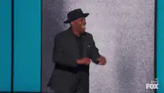 Steve Harvey dancing on stage