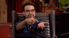 Conan O'Brien pointing and saying Gimme