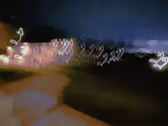 glitchy night city with floating hearts