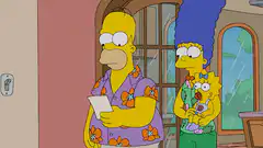 Homer puts on glasses to read a letter