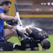 Rugby player gets hit with smoke bomb