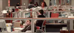 Office workers panicking and diving under desks