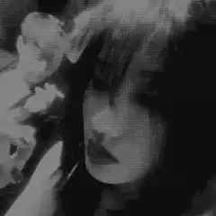 grainy black and white montage of a girl and a train