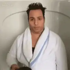 Man spills coffee on bathrobe