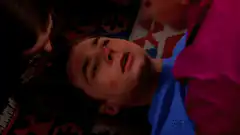 Young Sheldon lying on the floor