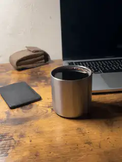 Coffee cup on wooden desk