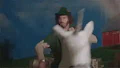 Buddy the Elf rides a unicorn