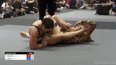 Woman in leopard print does a backflip over opponent
