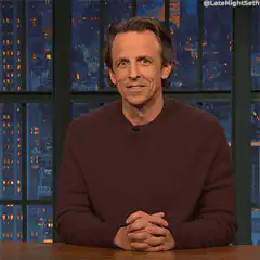 Seth Meyers points to the side
