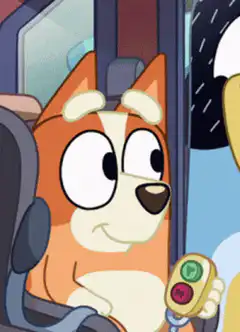 Bluey holding a remote with smug expression