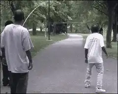 man pulled by rope in park