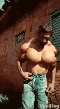 Man flexing huge chest muscles