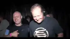 Bald man dancing with wide eyes