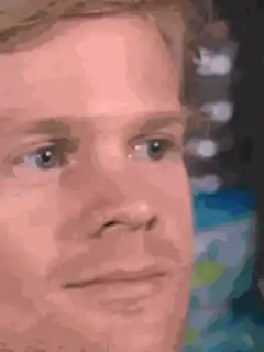 Man blinking and looking around