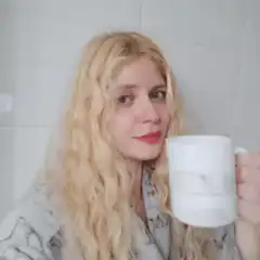 Blonde woman holding a mug