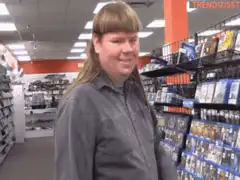 Woman smiling in video game store