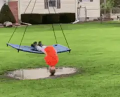 Kid on swing dips head in puddle