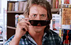 Dennis Quaid puts on sunglasses