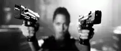 Angelina Jolie as Lara Croft with dual pistols