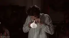 Man puts garlic cloves on his eyes