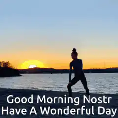 Woman doing yoga at sunrise