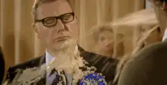 Man gets hit with cake