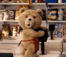Ted dancing in a grocery store