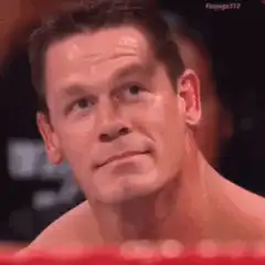 John Cena smirking and looking down