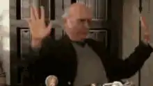 Don Corleone raising hands in surrender