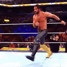 Roman Reigns stomps John Cena