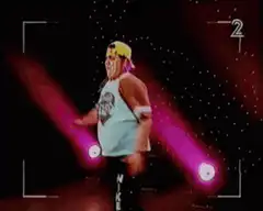 Fatman Slim dancing with arm raised