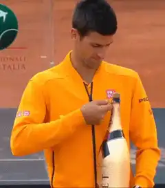 Novak Djokovic opening champagne