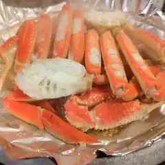 crab legs on foil