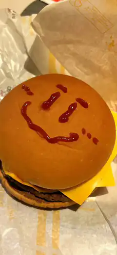 Burger with ketchup smiley face