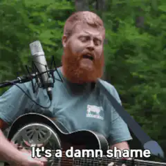 Man singing with a giant beard