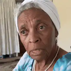 Older woman winking and making a face