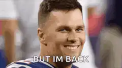 Tom Brady smiling but im back