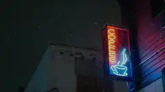 Neon coffee sign in snow