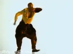Man in yellow shirt dancing