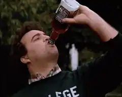 Drew Carey chugs a bottle of Jack Daniel's