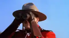 Mountie lowers binoculars