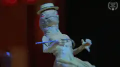 Lizard playing guitar on a table