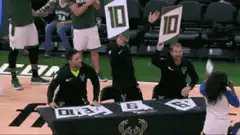 Referees hold up 10 point signs