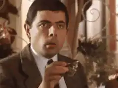 Mr. Bean eating an oyster