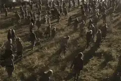 Zombie horde walking across a field