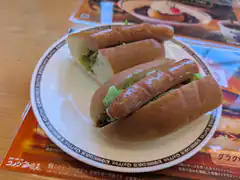 Two hot dogs on a plate