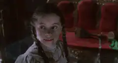 Wednesday Addams puts finger to lips