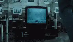 Ted Strider watches TV and sees himself in a well
