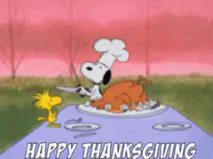 Snoopy carves turkey Happy Thanksgiving