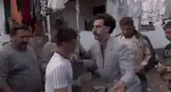 Borat slaps man in market